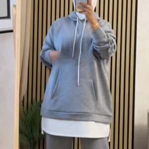 EaseLayer Set A modest two-piece outfit featuring a long layered hoodie-style top with a relaxed fit, drawstring detail, and wide-leg trousers. Designed for comfort, coverage, and modern modest style.