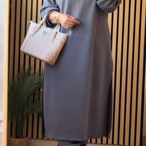 A modest long hoodie dress featuring a relaxed fit, drawstring hood .Designed for full coverage, comfort, and modern everyday modest style.