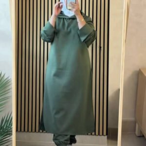 A modest long hoodie dress featuring a relaxed fit, drawstring hood .Designed for full coverage, comfort, and modern everyday modest style.