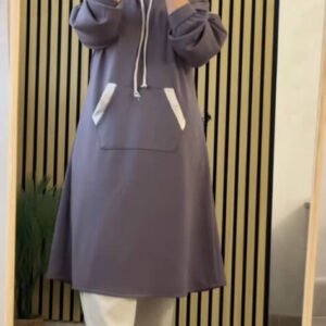 A modest long hoodie outfit featuring a relaxed silhouette with a drawstring hood and a large kangaroo pocket. Designed for comfort, full coverage, and effortless everyday modestwear.