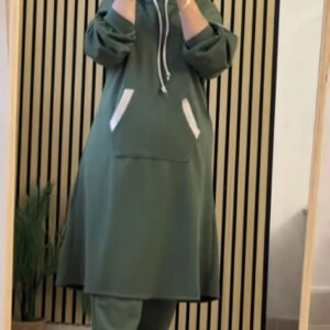 A modest long hoodie outfit featuring a relaxed silhouette with a drawstring hood and a large kangaroo pocket. Designed for comfort, full coverage, and effortless everyday modestwear.