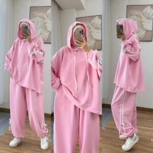 EaseFit Modest Tracksuit featuring a relaxed hooded top with white drawstrings and wide-leg trousers with side tie details, designed for modest comfort and sporty style, styled with a white inner hijab and sneakers in a soft indoor setting