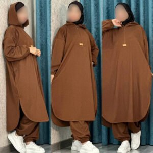 A modest hooded outfit featuring a loose, flowy silhouette with a front zip, side pockets, and elastic cuffs. Designed for comfort, flexibility, and full coverage for workout and everyday modest wear.