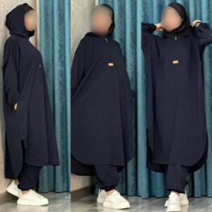 A modest hooded outfit featuring a loose, flowy silhouette with a front zip, side pockets, and elastic cuffs. Designed for comfort, flexibility, and full coverage for workout and everyday modest wear.