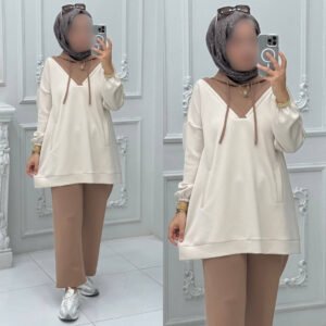 A modest two-piece outfit featuring a relaxed long-sleeve hoodie-style top with a V-neck panel and adjustable drawstrings, paired with wide-leg trousers. Designed for effortless comfort, full coverage, and a contemporary modest look suitable for casual or active wear.