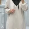 A modest two-piece outfit featuring a relaxed long-sleeve hoodie-style top with a V-neck panel and adjustable drawstrings, paired with wide-leg trousers. Designed for effortless comfort, full coverage, and a contemporary modest look suitable for casual or active wear.