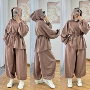 Modest two-piece women’s sporty outfit in many colors featuring a loose-fit hooded top with adjustable drawstring waist and wide-leg trousers, styled with an inner hijab cap