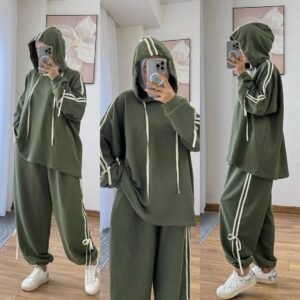 EaseFit Modest Tracksuit featuring a relaxed hooded top with white drawstrings and wide-leg trousers with side tie details, designed for modest comfort and sporty style, styled with a white inner hijab and sneakers in a soft indoor setting