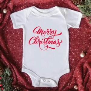 White baby romper with Santa Claus print and “Baby’s 1st Christmas” text — First Christmas Magic edition.