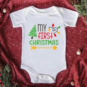 White baby romper with Santa Claus print and “Baby’s 1st Christmas” text — First Christmas Magic edition.