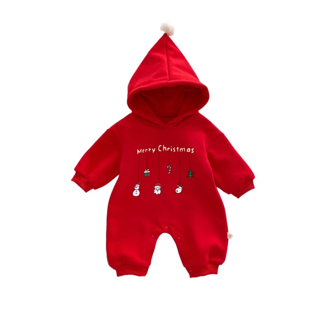 Baby Christmas romper with hoodie and red pom-pom, decorated with hanging festive icons including Santa, snowman, gift box, candy cane, and Christmas tree — “Festive Dangles” design.
