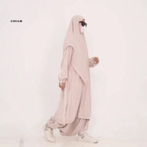 A modest sporty jilbab featuring a flowy hooded design with long sleeves, full coverage, and easy movement. Designed for active, confident women seeking comfort and modest elegance.