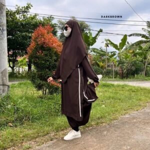 A modest sporty jilbab featuring a flowy hooded design with long sleeves, full coverage, and easy movement. Designed for active, confident women seeking comfort and modest elegance.