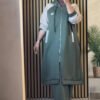 A modest two-piece outfit featuring a long zip-front hoodie jacket with contrast sleeves and wide-leg trousers. Designed for flexibility, layering, and effortless modest style.