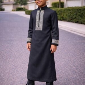 Luxury boys kaftan set with detailed embroidery and structured neckline.