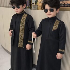 Luxury boys kaftan set with detailed embroidery and structured collar.